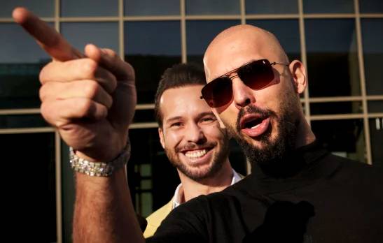 Influencer Andrew Tate facing charges in Romania leaves for US