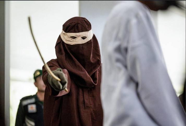 Two men publicly flogged in Indonesia for gay sex