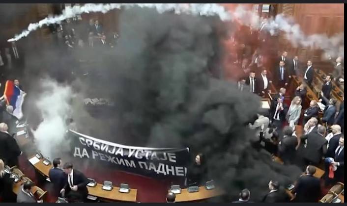 Chaos as Serbia opposition set off flares in parliament to back protests