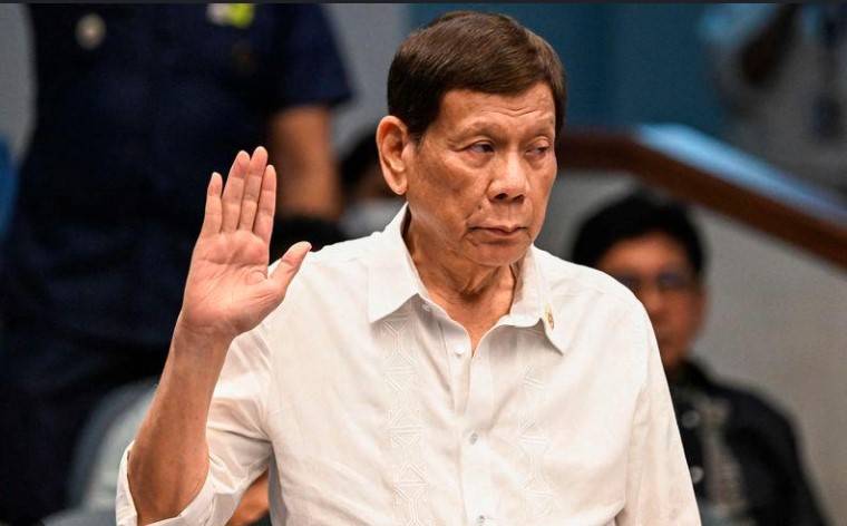 Duterte says he is 'responsible' as ICC takes him into custody