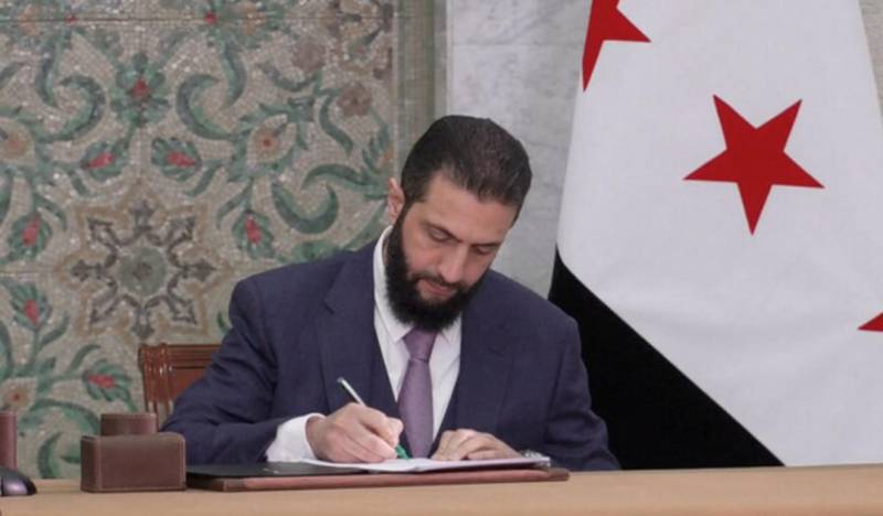 Syria leader signs constitutional declaration, hailing 'new history'