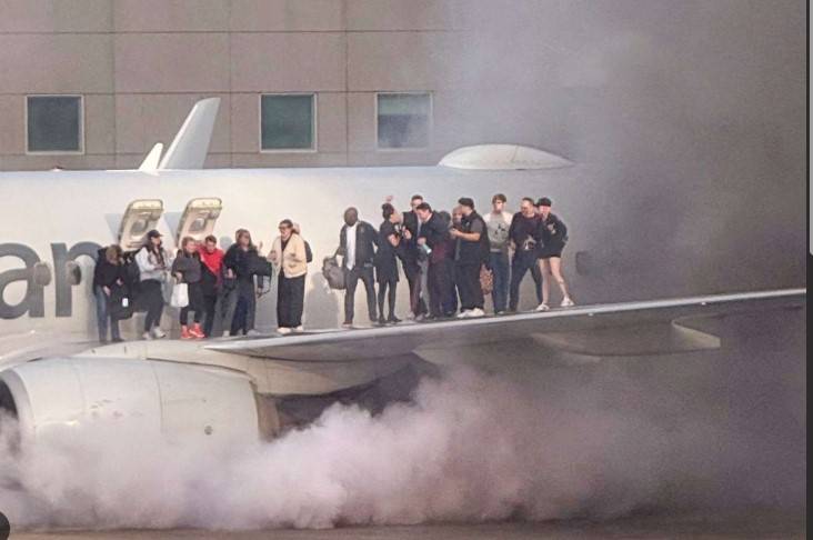 12 injured in fire aboard US plane after diverted to Denver 