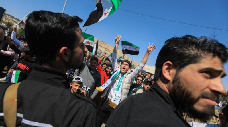 Syrians commemorate uprising anniversary for first time since Assad's fall
