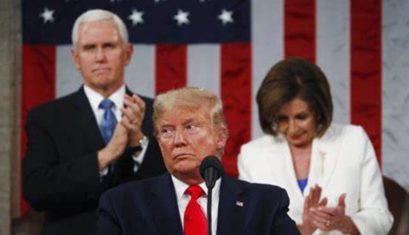 US Democrats fume as some in party cave to Trump on spending bill
