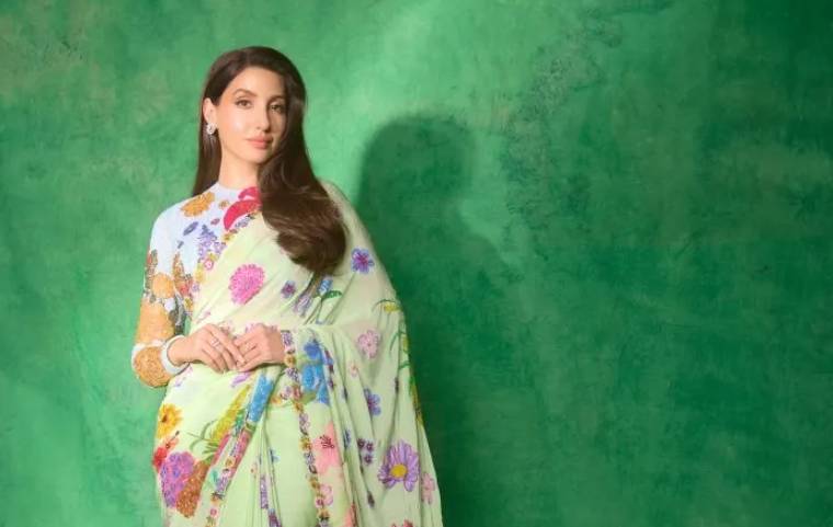 Nora Fatehi slays in an exquisite floral saree