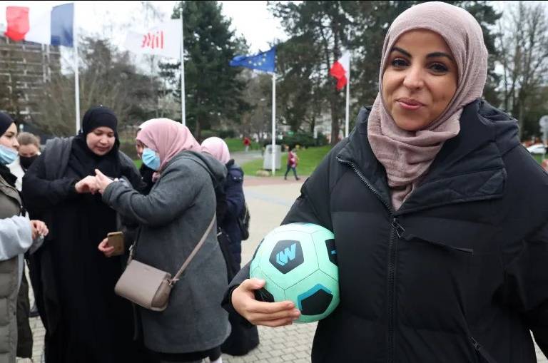 French PM seeks to mend cabinet rift over hijab in sport