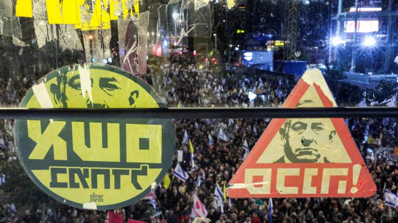 Israel opposition urges general strike over security chief ouster