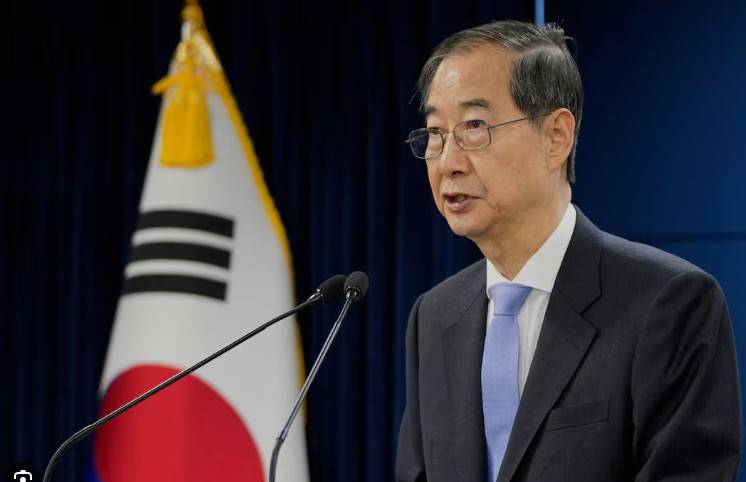 South Korea court reinstates impeached PM Han as acting president