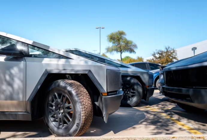 Tesla sales sink by nearly half in Europe