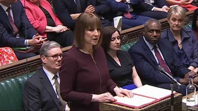 UK slashes growth forecast, cuts public spending