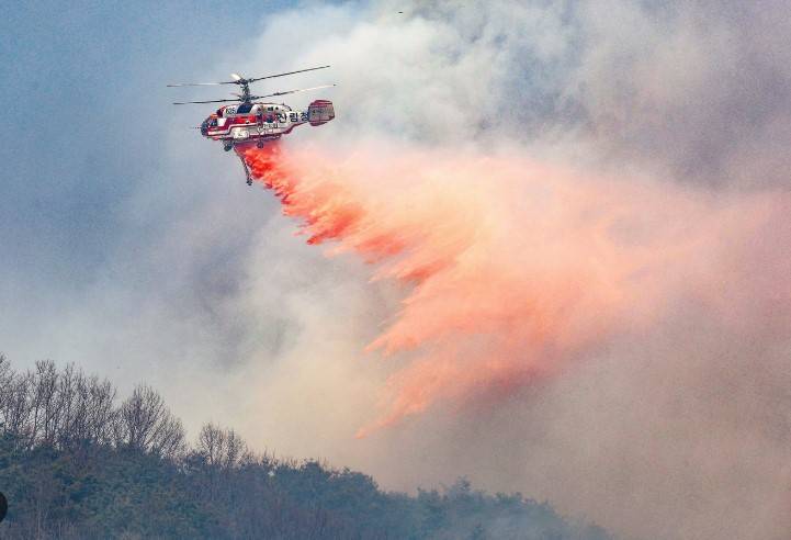 South Korea firefighters deploy helicopters as wildfires reignite