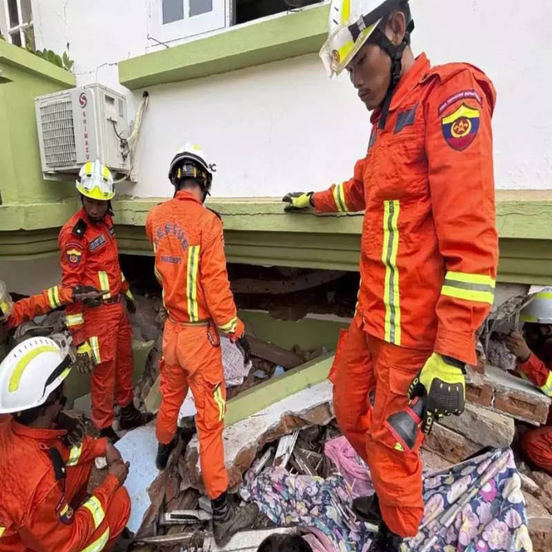 Myanmar rescuers lose battle to save pregnant woman trapped in building