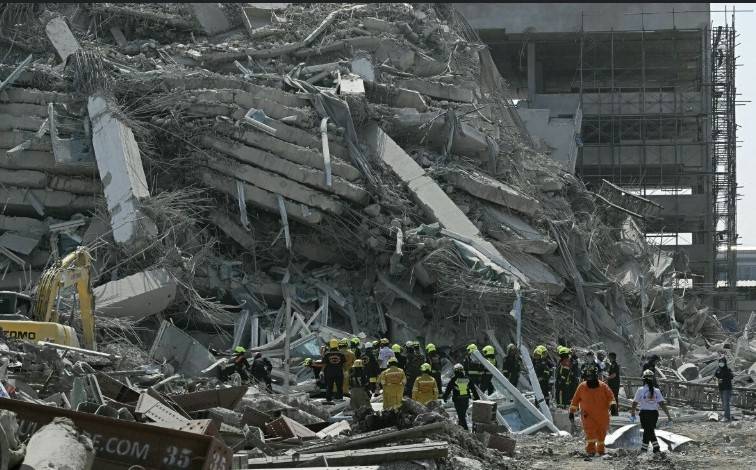 China urges firms to follow laws after Bangkok building collapse