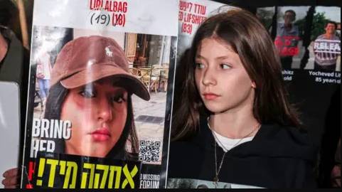Hamas releases video showing two Israeli hostages alive