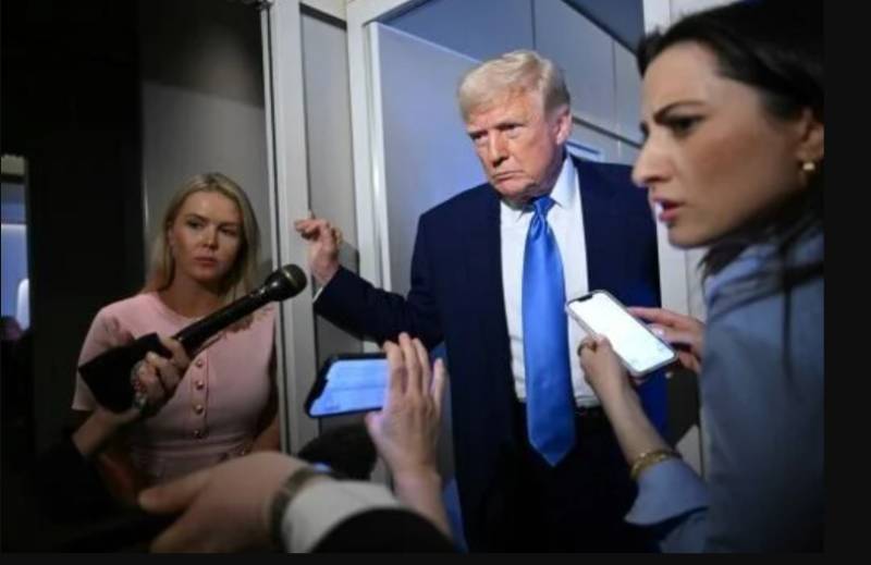 Trump warns against 'stupid' panic as markets plummet