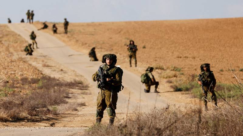 Israel's defence minister says troops seizing 'large areas' in Gaza, expanding buffer zones