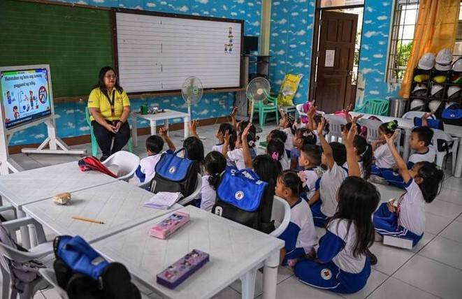 Early holiday, more fans: Philippines schools adapt to climate change