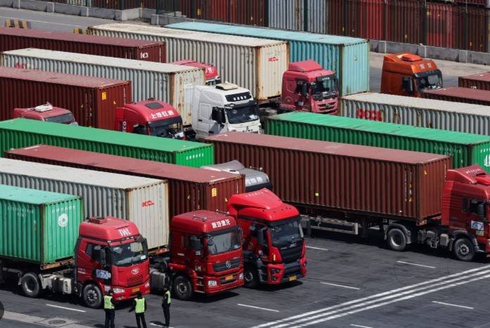 China says economy grew 5.4% in first quarter, beating forecasts