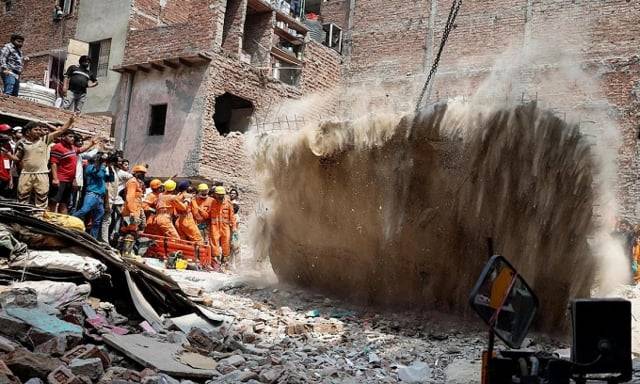 At least 11 killed in India building collapse