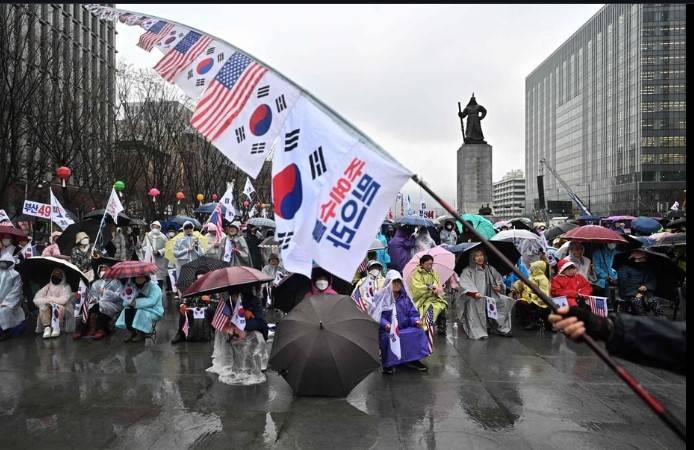 South Korea's economy shrinks as trade war hits exports