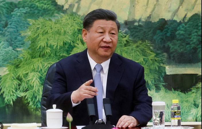 China's top leaders pledge economic support as trade war rages