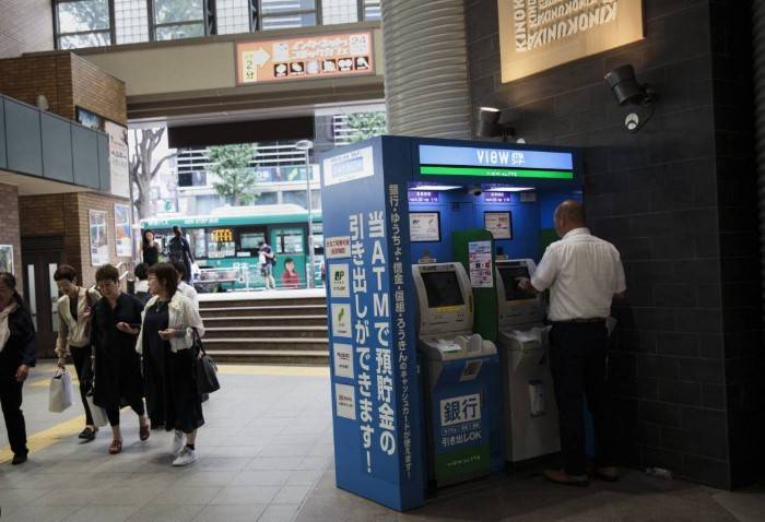 No phone calls at the ATM, Japan's Osaka tells over-65s