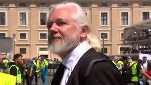 Wikileaks founder Assange joins crowds for pope funeral