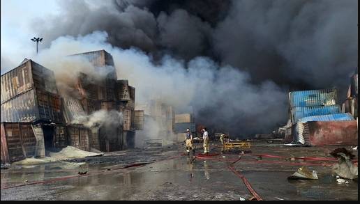Iran's president visits site of port blast that killed 28