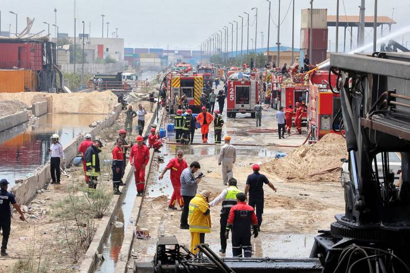 Iran minister blames 'negligence' for port blast that killed 65