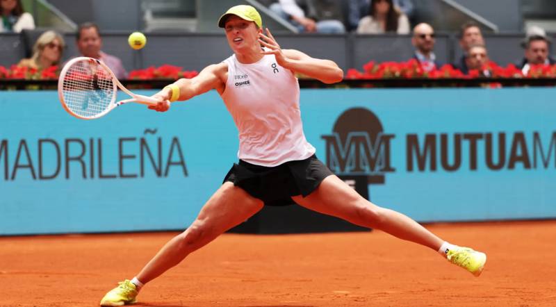 'Chilled' Swiatek scrapes into Madrid Open last eight