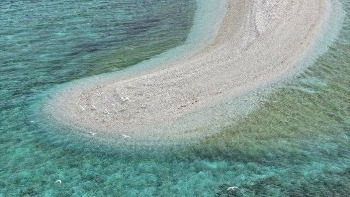 Vietnam protests China, Philippines claims on South China Sea reef