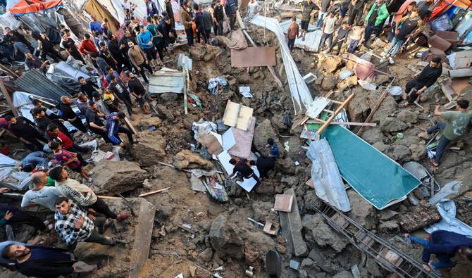 Gaza rescuers say 31 killed in Israeli strikes on school sheltering displaced