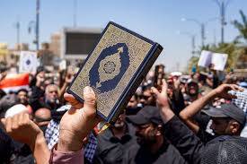 Denmark fines two for desecrating Koran