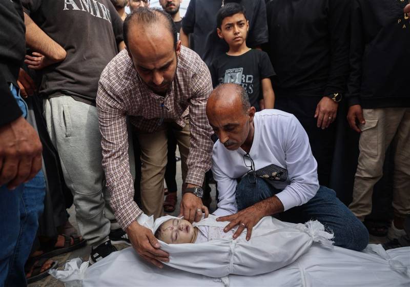 Israel says letting baby food into Gaza, first aid since March