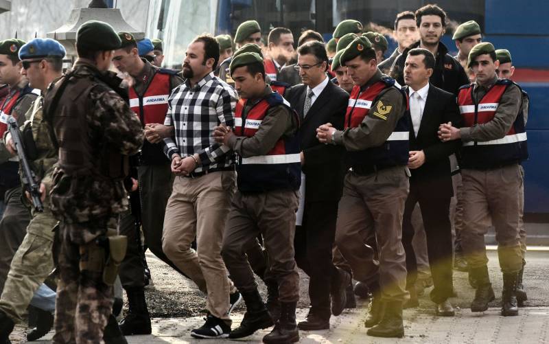 Turkey arrests 65 soldiers, police for ties to late Erdogan foe