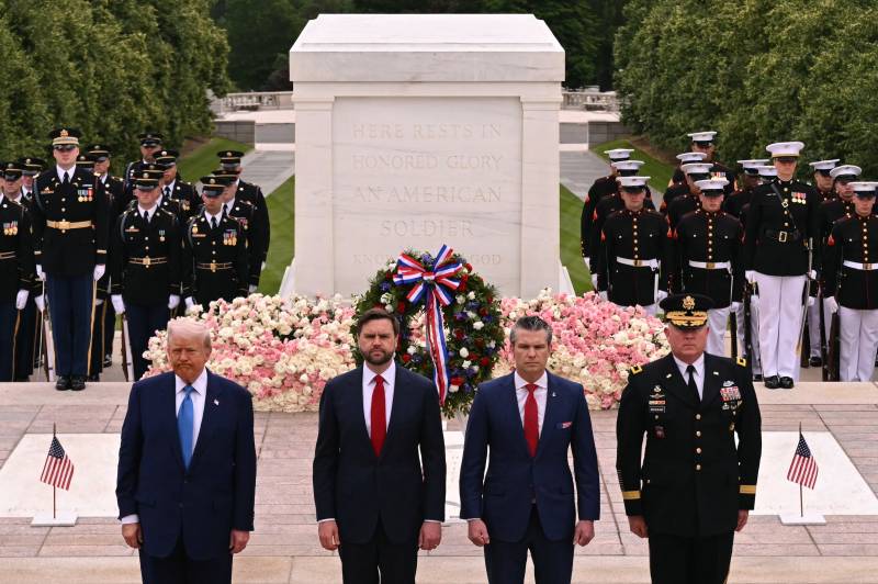 Trump attacks opponents, judges on day honoring US war dead