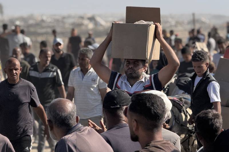 Thousands storm aid warehouse in Gaza as hunger crisis deepens