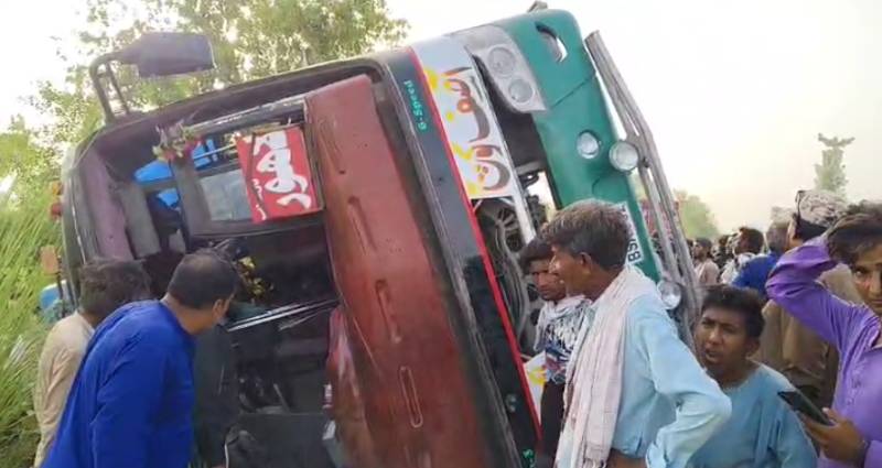 Seven-month-old girl killed, over 15 injured as passenger coach overturns near Nawabshah
