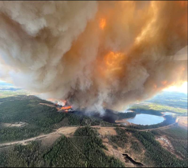 Thousands on verge of wildfire evacuations in western Canada