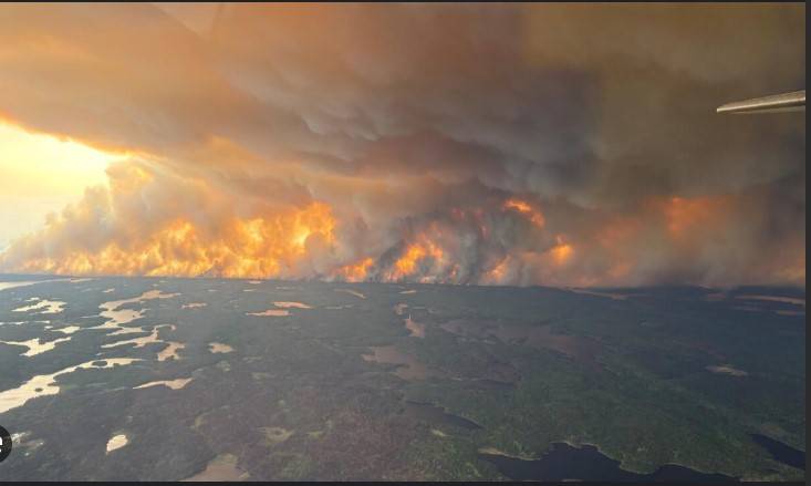 Canadian wildfire emergency spreads to second province