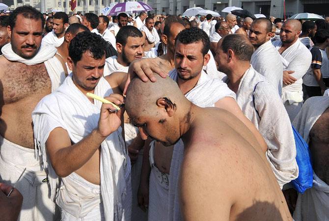 Inside Saudi's hajj-only barbershop, shaving thousands of heads in a day