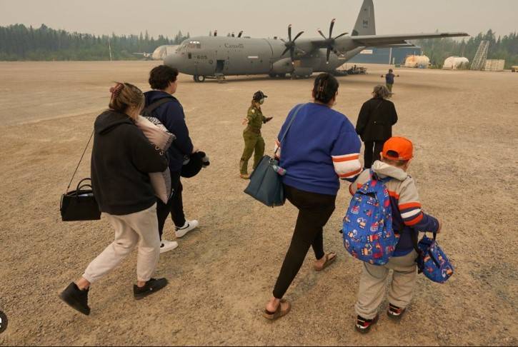 Military aids evacuations as Canada wildfires expand eastward