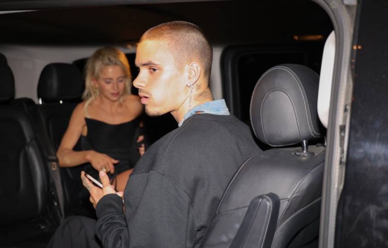 Romance rumours run wild as Romeo Beckham steps out with older German beauty