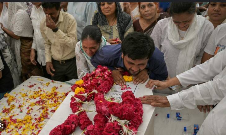 Relatives wait for remains after Air India crash