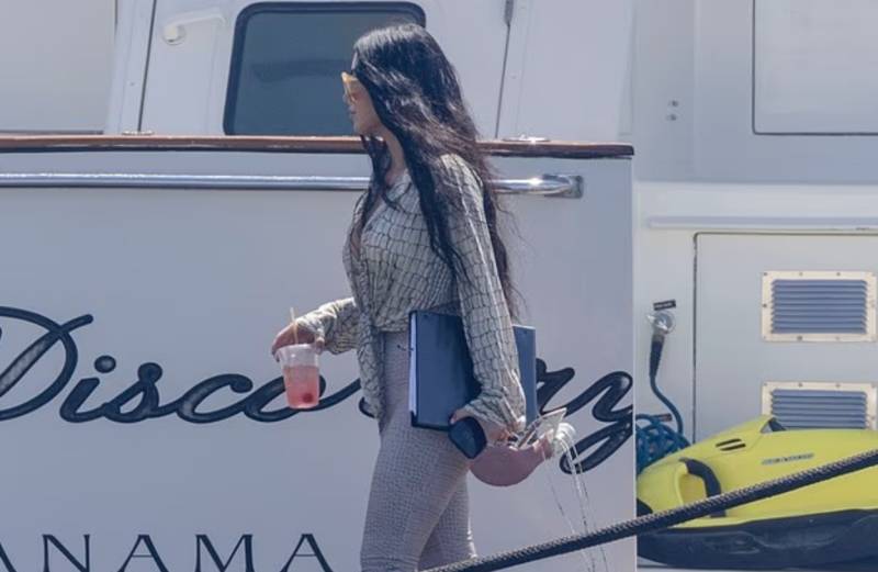 Kim Kardashian flaunts tiny waist on luxurious yacht outing