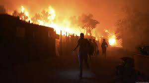 Wildfire forces asylum seekers from Greece camp