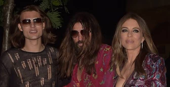 Elizabeth Hurley shares proud-parents moment with Damian and Miley Cyrus at London Premiere