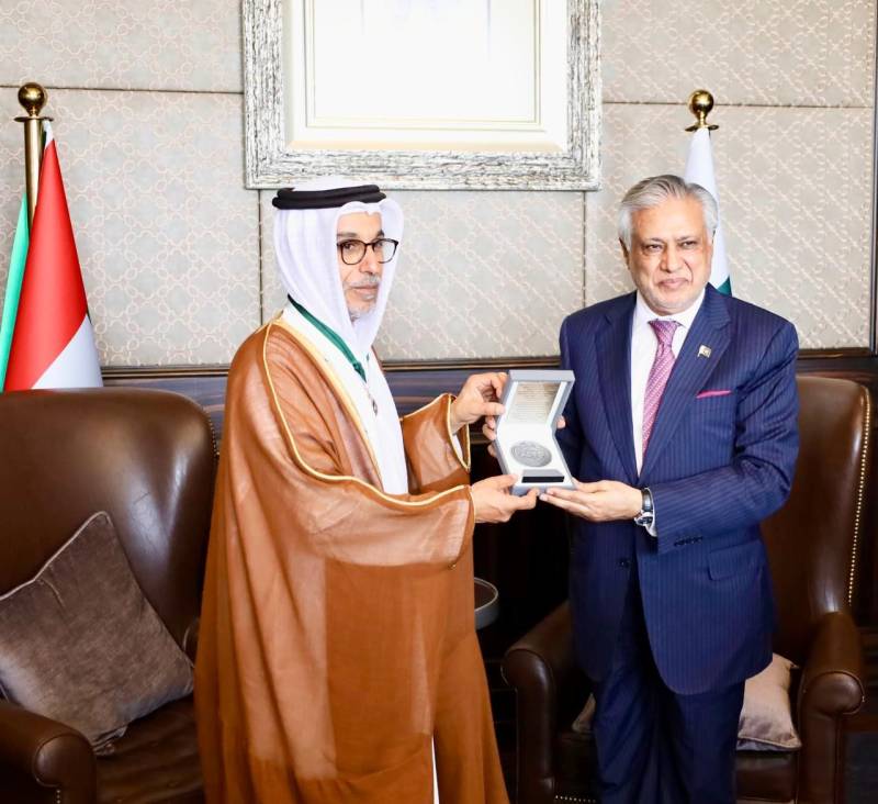 DPM Dar presents Hilal-e-Quaid-e-Azam to DG ADFD in Abu Dhabi.