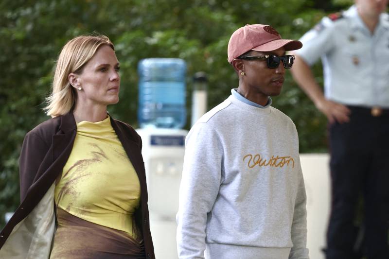 Pharrell bigs up brown denim as Paris fashion week starts