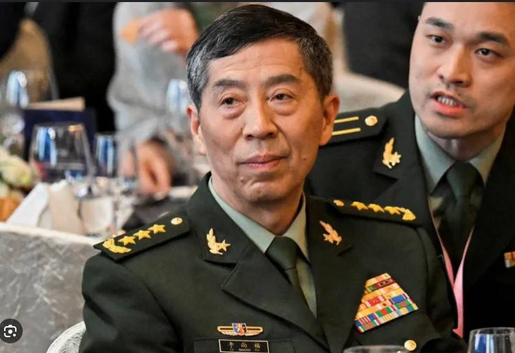 Top Chinese military official under corruption probe removed from office